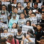 Hong Kong protesters on a rampage after police shooting of a teenager