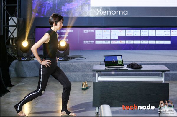 A model demonstrating e-skin in the form of pajamas for the elderly (Image credit: TechNode)