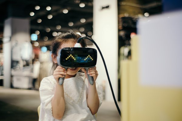 Girl using VR device Girl using VR device