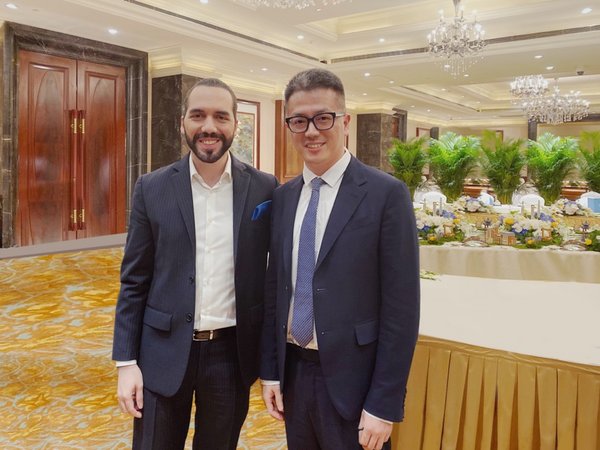 El Salvadorian president Nayib Bukele (left) meets with Trip.com Group CMO Sun Bo