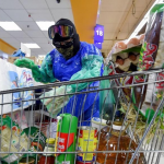 COVID-19: Engineer wears garbage bag to supermarket