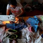 MCO: Single mother makes face mask to support children