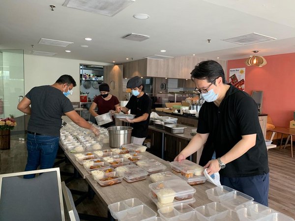 The Terrace Cafe’s kitchen crew preparing affordable and finger-lickin’ meals for customers amidst the MCO