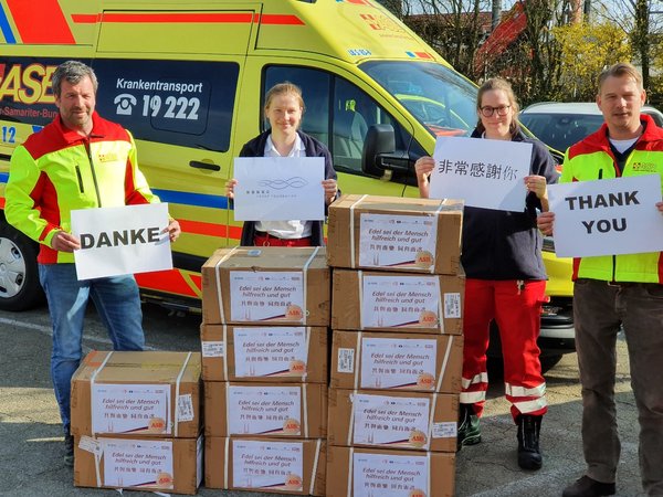 ASB members received medical supplies donated by Fosun, holding "Thank you very much" sign in Chinese. ASB members received medical supplies donated by Fosun, holding "Thank you very much" sign in Chinese.