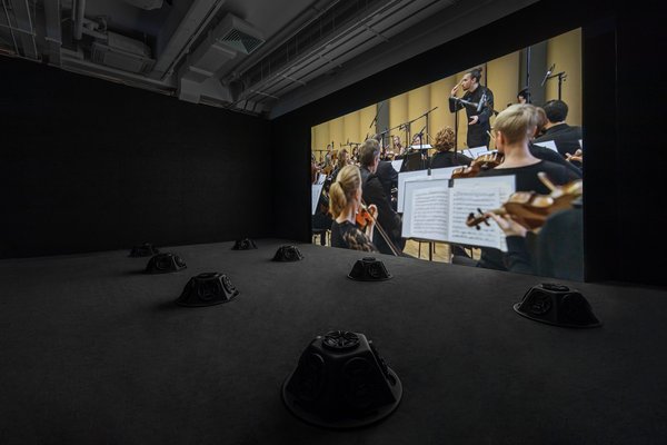 Muted Situations #22: Muted Tchaikovsky’s 5th, 2018. HD video, eight-channel sound installation, and carpet, 45 min, Courtesy of the artist. Installation view, 2019. Image: Winnie Yeung @ iMAGE28, Courtesy of M+, Hong Kong