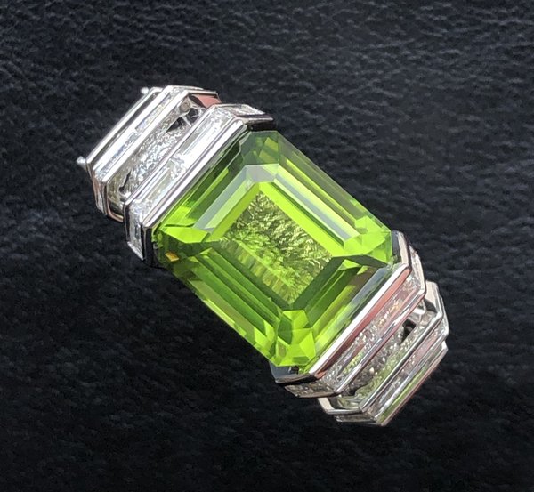 Customised white diamond enclave ring with rare 12.0 carats peridot gemstone