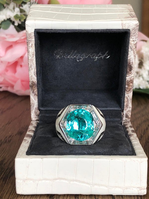 12.0 Carats Paraiba stone set on black diamond crusted enamel
