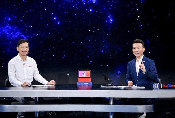 Robin Li and Hui Kang discussing household subjects with AI voice assistant Xiaodu during Baidu World 2020