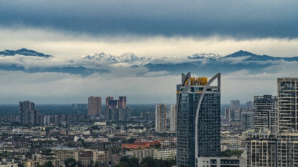 Chengdu offers a snow-capped mountain view. Chengdu offers a snow-capped mountain view.