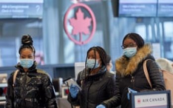 Canada to halt passenger flights from Britain to contain coronavirus
