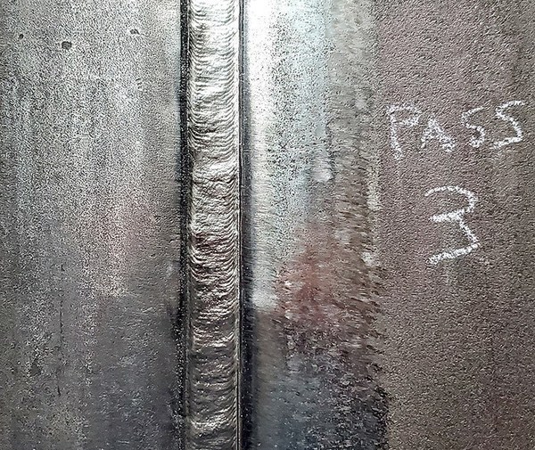 Designed for wide-weave flux cored welding on LNG tanks, Shield-Bright NiCrMo-3 creates an exceptionally flat bead profile, as shown in this automated 3G weld, reducing concerns related to hot cracking susceptibility and stress concentrations. Designed for wide-weave flux cored welding on LNG tanks, Shield-Bright NiCrMo-3 creates an exceptionally flat bead profile, as shown in this automated 3G weld, reducing concerns related to hot cracking susceptibility and stress concentrations.