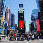 “Pineapples from Guangdong, China, a burst of flavor in every bite” appears on the China Screen of Times Square, New York