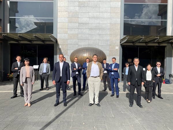 TCC Chairman Nelson Chang (front-row middle), TCC General Manager John Li ( on the right of the front row), and NHOA CEO Carlalberto Guglielminotti (the second from the left of the front row) with the management team of NHOA.
