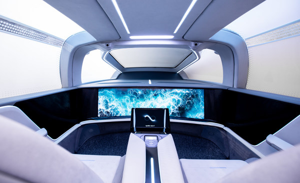 Interior of Baidu’s robocar, featuring an intelligent display, control pad and no steering wheel or pedals