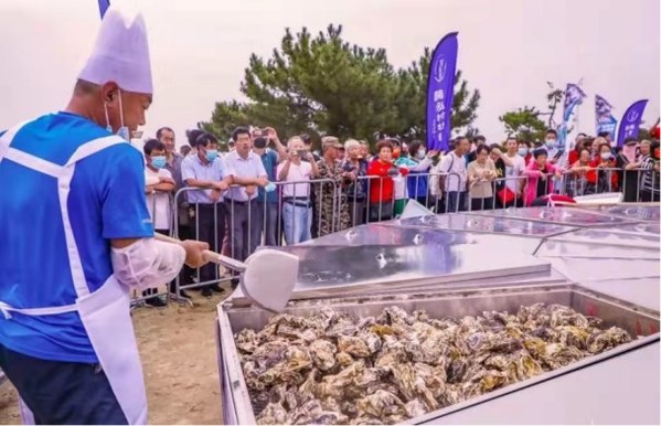 Tourists enjoy the Super Oyster Feast