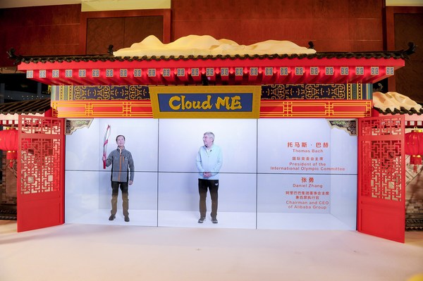 Daniel Zhang in Shanghai Cloud ME studio (left), with Thomas Bach from Beijing closed-loop (right), having a true-to-life meeting ‘projected’ at the Beijing Media Center
