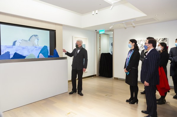 Representative of the curator Li Hong Fei and artist Xu Lei lead guests of honour on a tour of his exhibition, The Innovation of Ink: Transformation and Reinvention of Oriental Aesthetics – Featured Exhibition of Wang Dongling & Xu Lei.