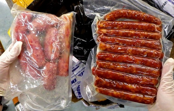 Sausages detected in international parcels.