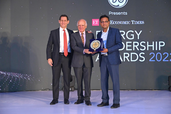 Joseph Sigelman and Abhilesh Gupta from AG&P receiving the Energy Company of the Year Award