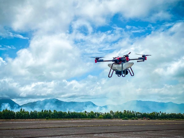 The XAG P100 agricultural drone spread fertilizers to the rice paddy in Vietnam