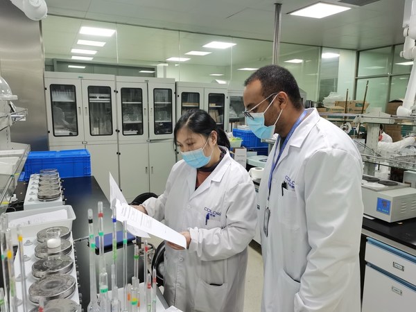 Daniel Tolessa Negera (right), an Ethiopian student at Hefei University of Technology, conducts a product quality test at a cosmetics laboratory in Suzhou, Jiangsu province. Daniel Tolessa Negera (right), an Ethiopian student at Hefei University of Technology, conducts a product quality test at a cosmetics laboratory in Suzhou, Jiangsu province.