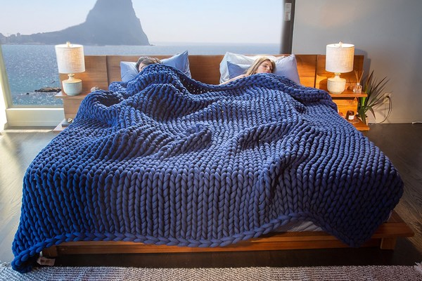 YNM Weighted Blanket&nbsp;comes in a wide&nbsp;range&nbsp;of styles, colors, weights, and sizes to suit everyone's needs. This year, YNM Home has upgraded their popular knitted weighted blankets for an even more "snug as a hug" night's sleep. Photo Credit: YNM HOME