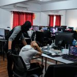 Immigration Dept detains 164 online scammers operating from holiday resorts