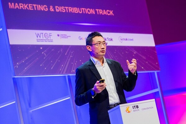 Ray Chen, SVP and CEO of Accommodation Business at Trip.com Group, delivering a keynote speech on stage on Reconnecting the World at ITB