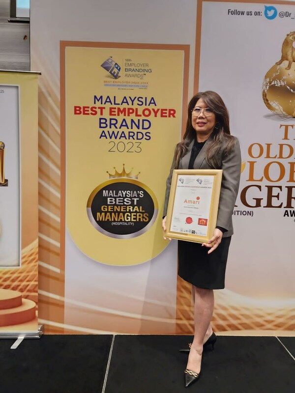Ms. Pauline Chua with the Malaysia Brand Leadership Award 2023, signifying the hotel's milestone.