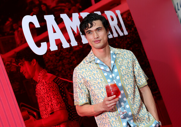 Actor Charles Melton enjoys a Campari aperitif at Campari: Discover Red event experience ahead of his premiere for May December at the 76th Annual Festival de Cannes. Actor Charles Melton enjoys a Campari aperitif at Campari: Discover Red event experience ahead of his premiere for May December at the 76th Annual Festival de Cannes.