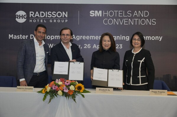 (L-R) Radisson Hotel Group (RHG) APAC Chief Development Officer Ramzy Fenianos, RHG Chief Executive Officer Federico González, SM Hotels and Conventions Corp. (SMHCC) President Elizabeth Sy, and SMHCC Executive Vice President Peggy Angeles, at the Master Development Agreement (MDA) signing ceremony.