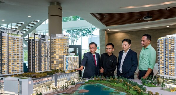 General Manager, Andrew Tan (far left) with Director, Michael Cheng (second from the right) and staff members of UMCITY.