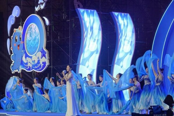 Performers are staging a dance with a song, "Hometown, the Sea", at the opening ceremony.