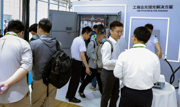 A HYXiPOWER representative demonstrates the firm’s PV Inverters and energy storage