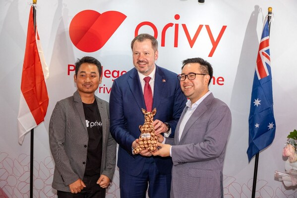 The Hon Ed Husic with Privy's Co-Founders Marshall Pribadi and Guritno Adi Saputra