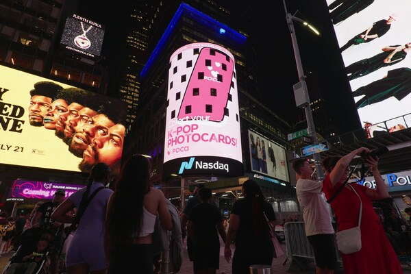Pocamarket on the Nasdaq billboard in Times Square in New York City Pocamarket on the Nasdaq billboard in Times Square in New York City