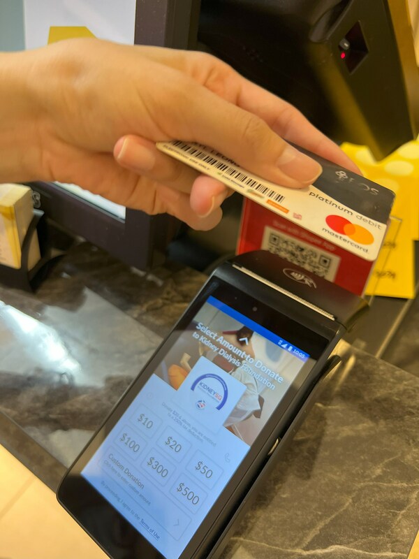 Figure 1: An example of a KDF GivePlease Donation Terminal that will be held by KDF staff and volunteers stationed islandwide on Flag Day. Photo courtesy of Kidney Dialysis Foundation.