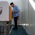 PM Anwar and Wan Azizah cast ballots in Permatang Pasir