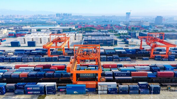 An aerial view of cranes working at the bustling Chengdu International Railway Port. An aerial view of cranes working at the bustling Chengdu International Railway Port.