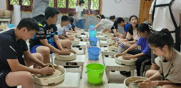 The youth representatives are learning the casting technique The youth representatives are learning the casting technique