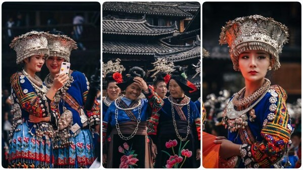 Women in tradional Miao embroidery costumes.