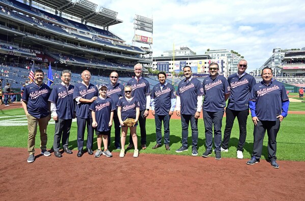 Commemorative photos of attendees taking part in the first pitch event.