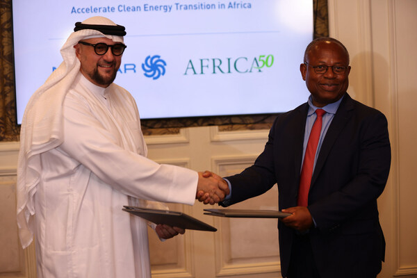 Masdar and Africa50 MoU - CEOs shake hands Masdar and Africa50 MoU - CEOs shake hands