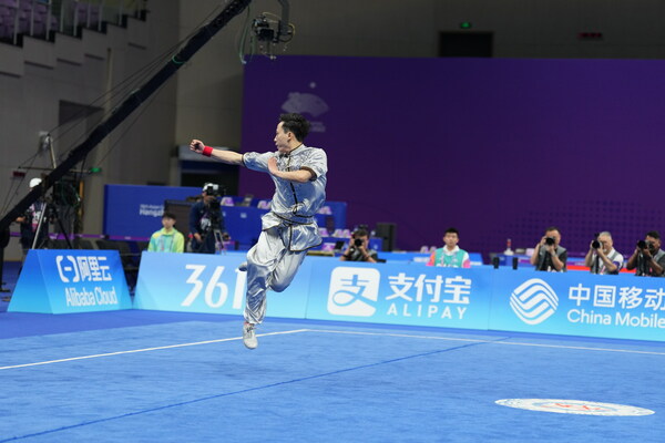 Sun Peiyuan competes at the men's Changquan final of Wushu at the 19th Asian Games in Hangzhou, east China's Zhejiang province, Sept. 24, 2023. (Photo by Li Yanfei/People's Daily) Sun Peiyuan competes at the men's Changquan final of Wushu at the 19th Asian Games in Hangzhou, east China's Zhejiang province, Sept. 24, 2023. (Photo by Li Yanfei/People's Daily)