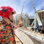 Rescuers try fourth attempt to shift beam to get to victims buried underneath