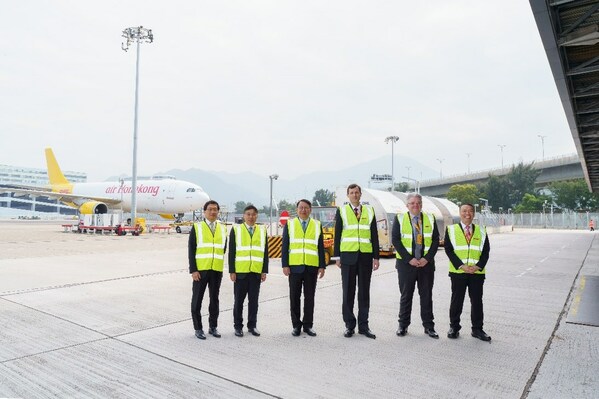 Officiating guests are captured in a moment with a DHL aircraft on the airside of the expanded Central Asia Hub in Hong Kong. With direct access to airside and landside, CAH is currently the only dedicated and purpose-built air express cargo facility in the Hong Kong International Airport. Officiating guests are captured in a moment with a DHL aircraft on the airside of the expanded Central Asia Hub in Hong Kong. With direct access to airside and landside, CAH is currently the only dedicated and purpose-built air express cargo facility in the Hong Kong International Airport.