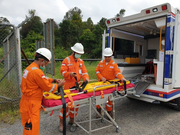 Staff preparing stretcher to be used for deployment Staff preparing stretcher to be used for deployment