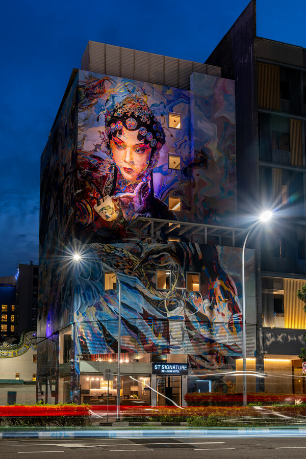 ST Signature Bugis Middle features a vibrant hand-painted wall mural across the entire building's facade. ST Signature Bugis Middle features a vibrant hand-painted wall mural across the entire building's facade.