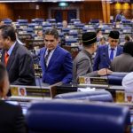 Opposition stages walkout after two MPs were ejected over sensitive remark