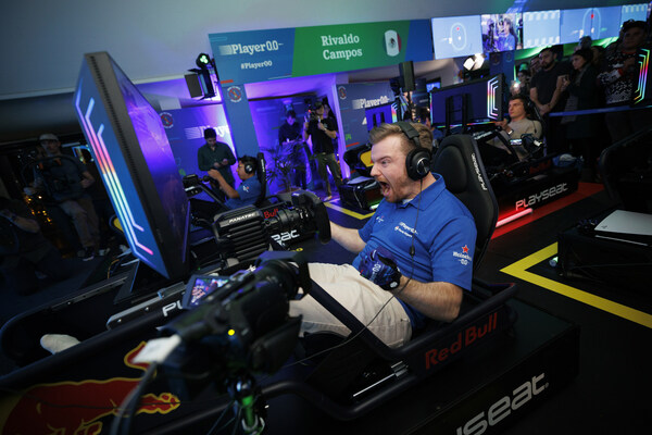 Finalist Floris Wijers of the Netherlands celebrates winning at the global final of Player 0.0 sim racing competition, hosted at the Heineken Experience on December 06, 2023 in Amsterdam Finalist Floris Wijers of the Netherlands celebrates winning at the global final of Player 0.0 sim racing competition, hosted at the Heineken Experience on December 06, 2023 in Amsterdam